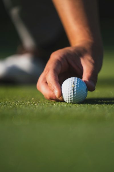 Photo Of A Player Placing Their Golf Ball For A Shot