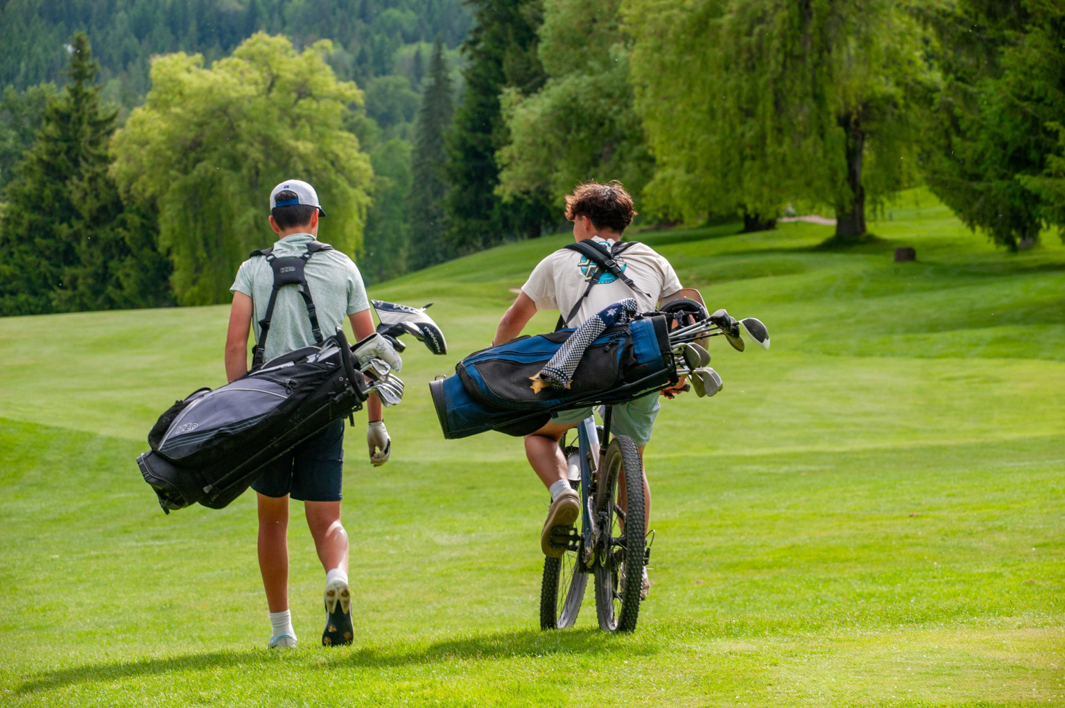 Friends enjoying a round of mountain golf in Rossland BC