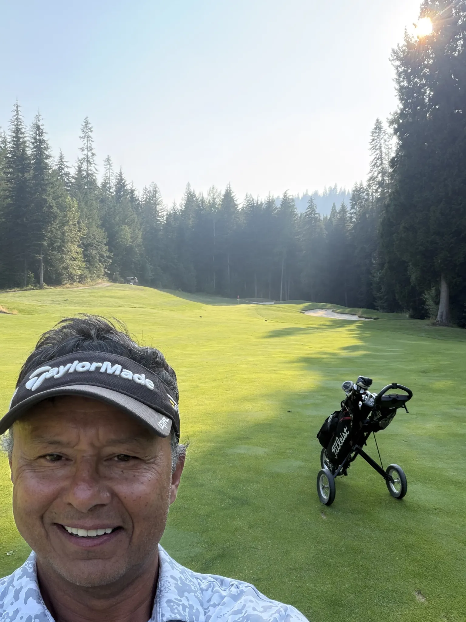 Redstone Resort owner on the Hole 14 fairway, Rossland BC golf course